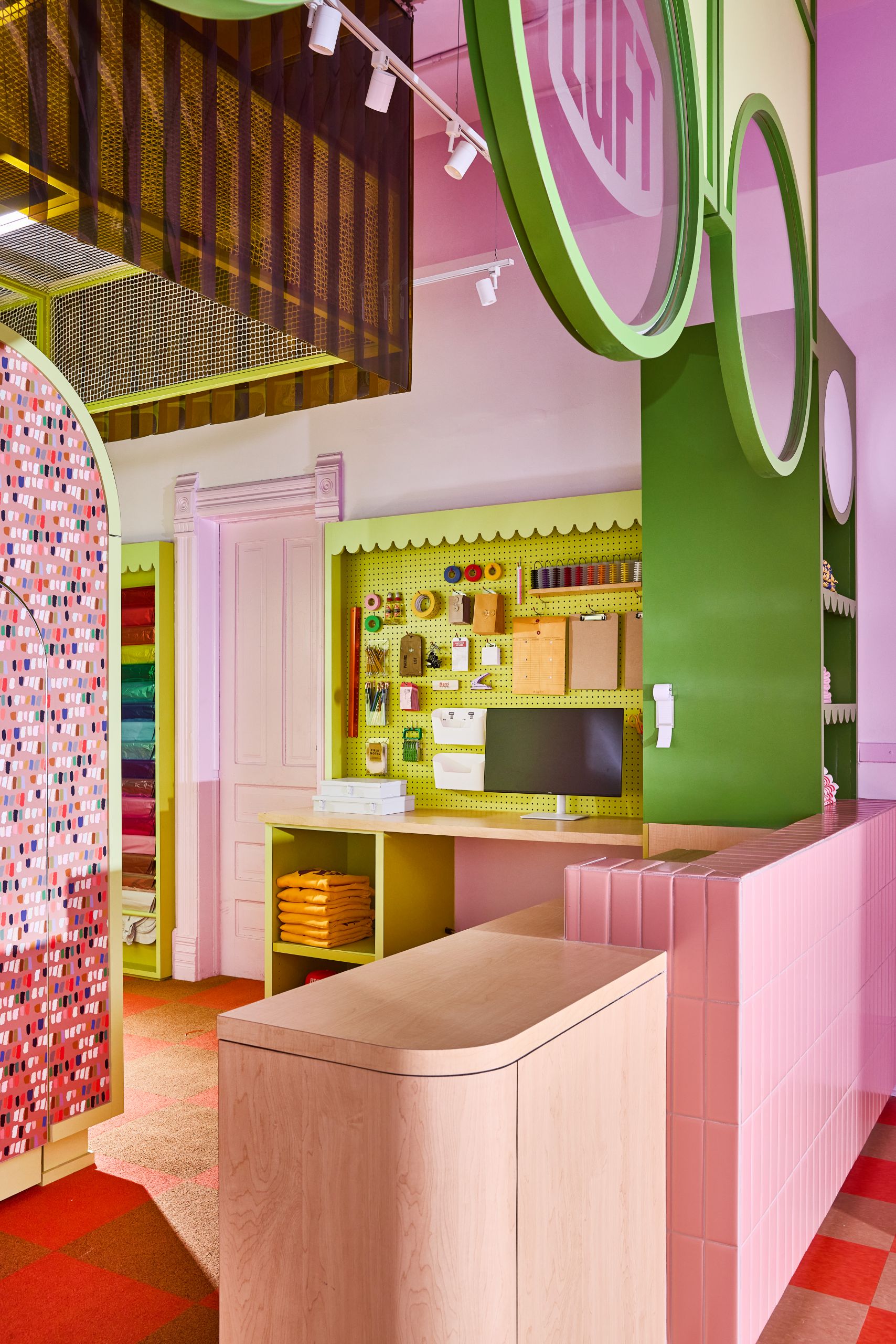 LUFT BALLOONS Chicago flagship interior featuring Abet Laminati Print HPL decorative laminates in 1850, 441, and 1823 Sei Finish, view of front counter.